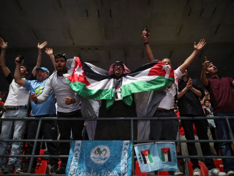 Jordan celebrates their first World Cup qualification after defeating Oman in a thrilling match.
