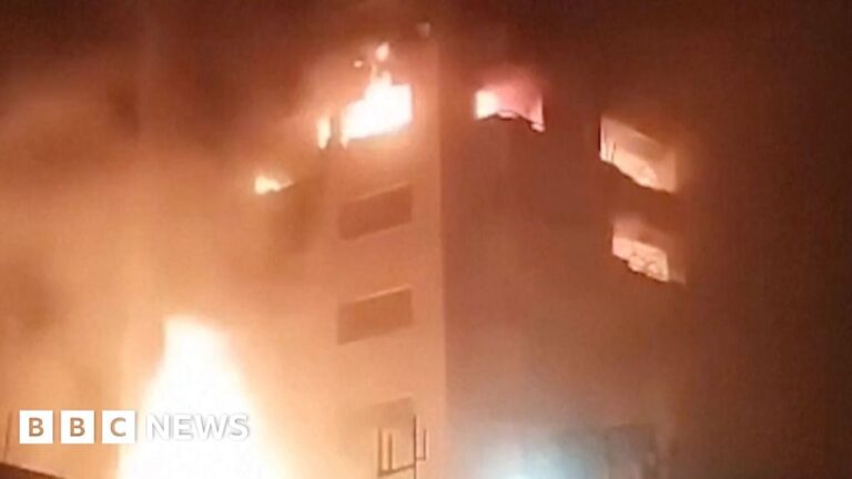 Video footage captures explosions and buildings on fire in Tehran, Iran