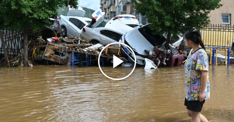 Beijing Overwhelmed by Deadly Flooding