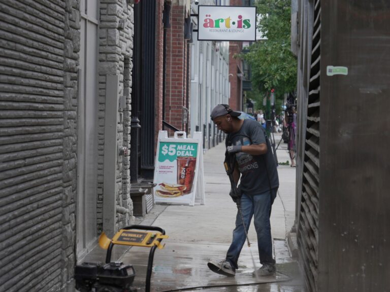 Four dead, 14 injured in mass shooting outside downtown Chicago lounge