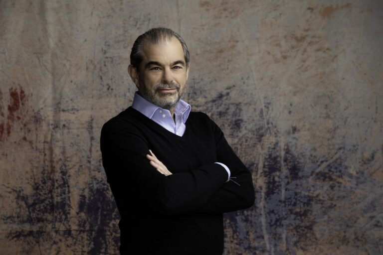 SESAC Music Group successfully raises $889 million through whole business securitization, with demand exceeding three times the original offering amount.