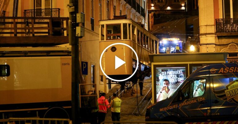 Workers clear debris from Lisbon Funicular