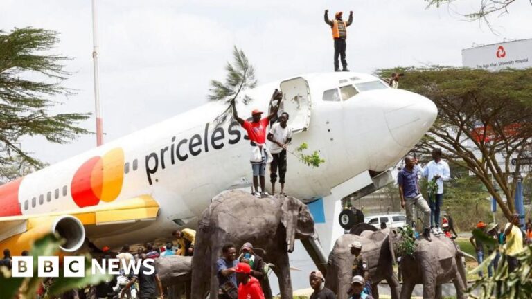 Massive crowds gather at Kenyan airport as it shuts down to receive ex-PM’s body