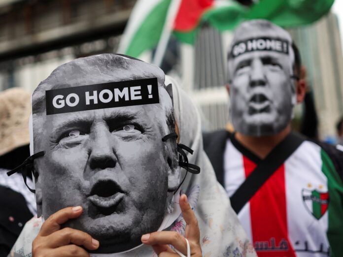 2025-10-24T084539Z_252615406_RC26IHAQUJ1S_RTRMADP_3_ASEAN-SUMMIT-MALAYSIA-PROTEST-1761297332.jpg