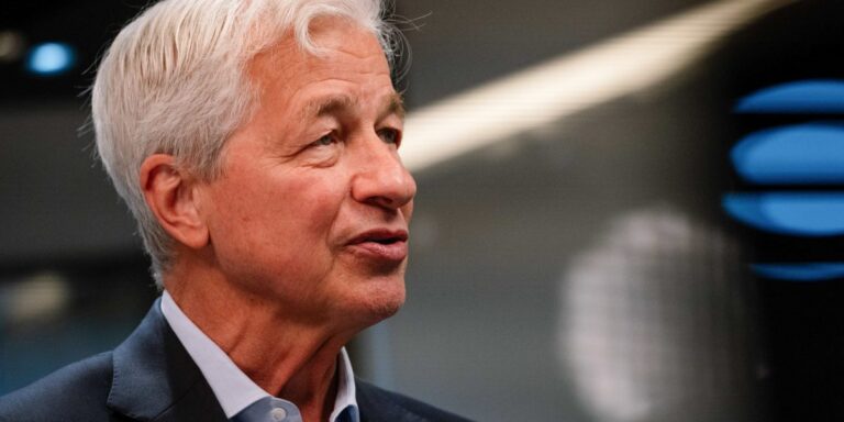 Jamie Dimon appears to be more open to blockchain technology in his recent comments, but remains quiet on Bitcoin.