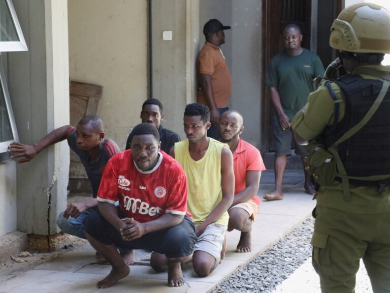 Tanzania detains top opposition leader and charges hundreds with treason amid protests