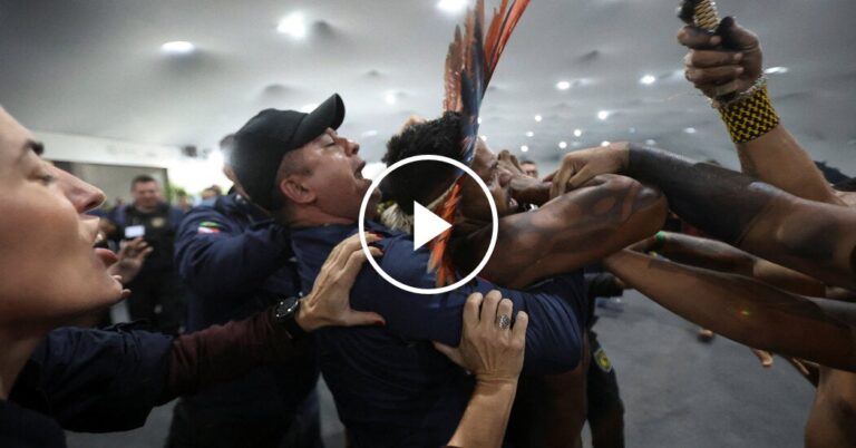Indigenous Protesters Engage in Confrontation with Guards at U.N. Climate Summit