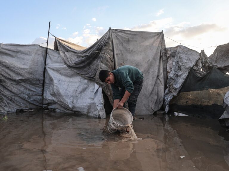 Palestinians in Gaza endure flooded tents and debris amid harsh weather conditions