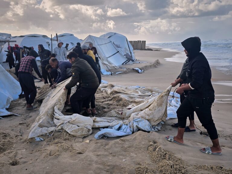 Gaza displacement camps face devastation as winter floods hit while aid is blocked by Israel