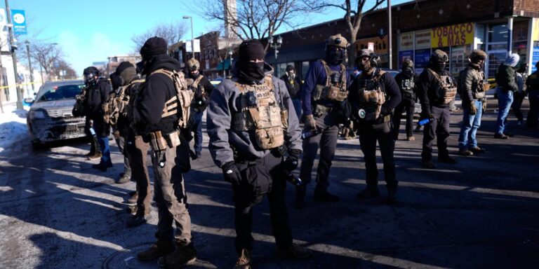 Icon of a Downward Pointing Arrow Button