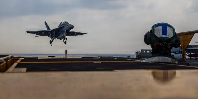 Stealth fighters join Carrier strike group in Mideast as Trump considers Iran strike, with Air Force jets and cargo planes en route.